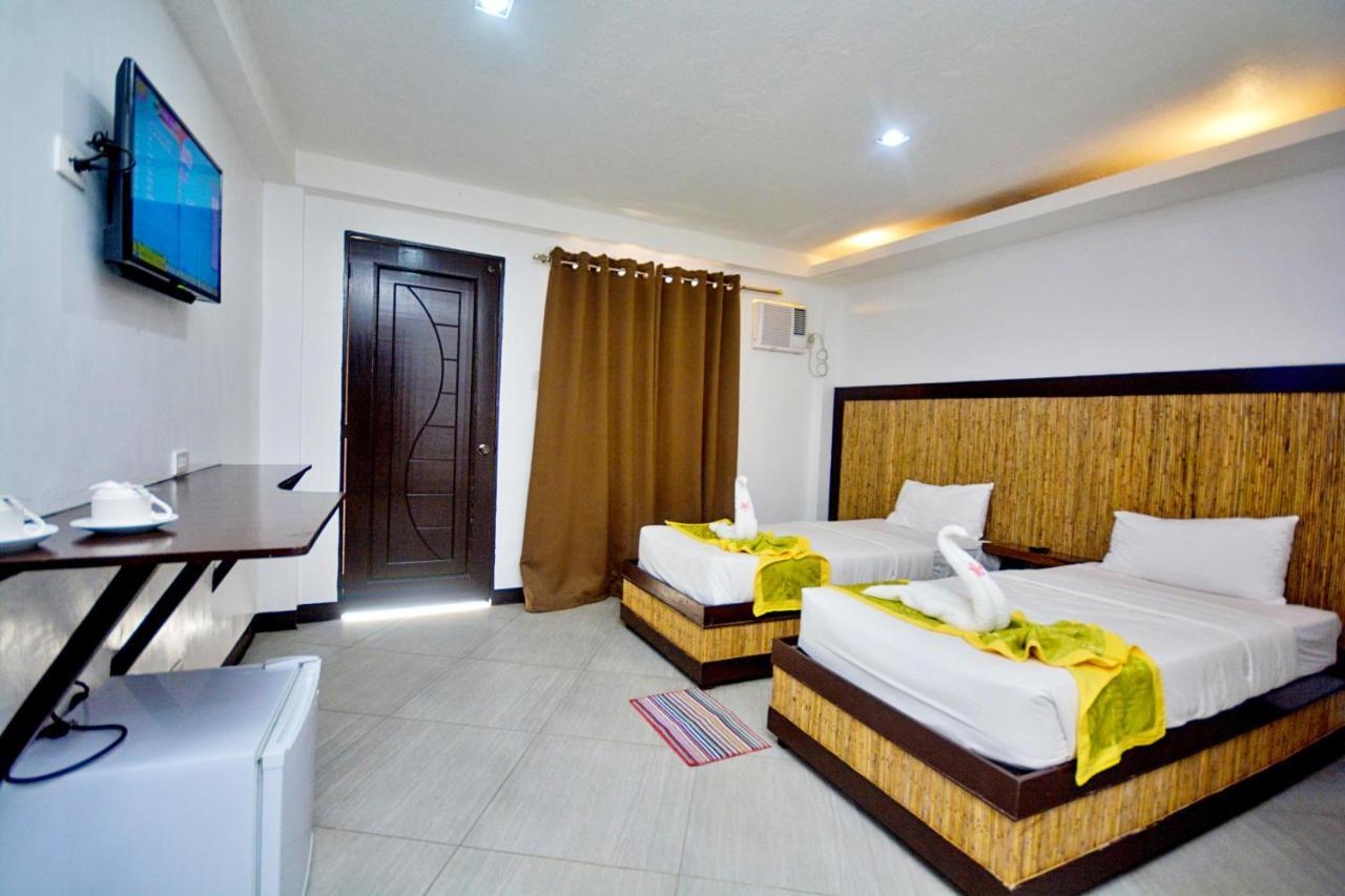Bamboo Beach Resort & Restaurant Manoc-Manoc Buitenkant foto